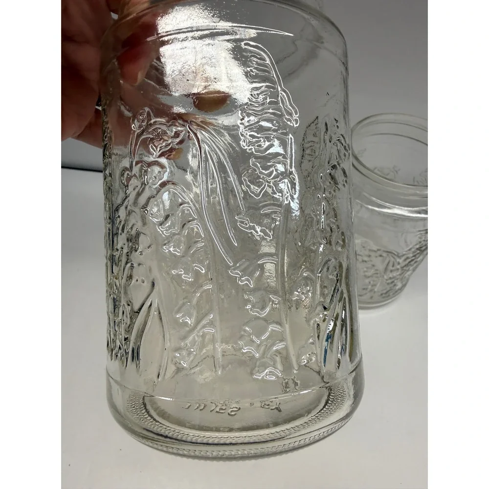 Vintage Lilies of the Valley Clear Glass Jars Embossed Floral Canisters Set of 2